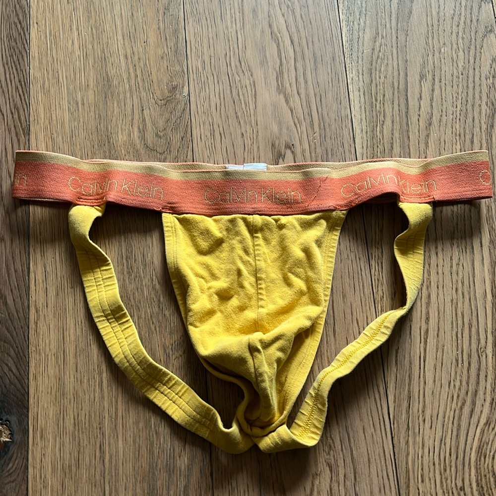 Yellow Calvin Klein jockstrap. Size Large
